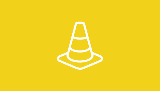 A graphic icon of a traffic cone is depicted. 